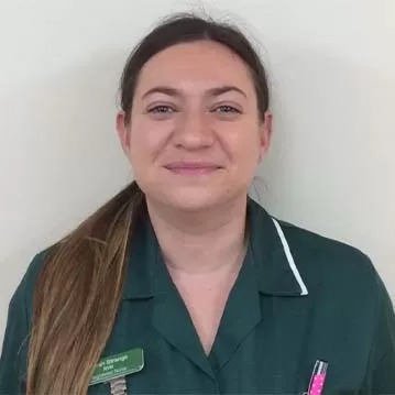 Smiling healthcare professional in uniform